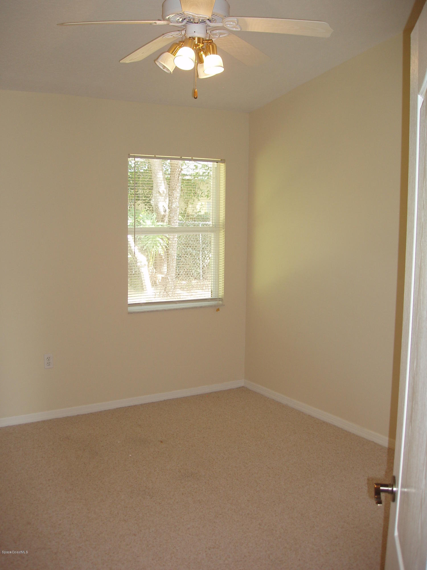740 Riviera Drive Northeast Palm Bay, FL 32905 - Photo 18 of 30 Bedroom 2