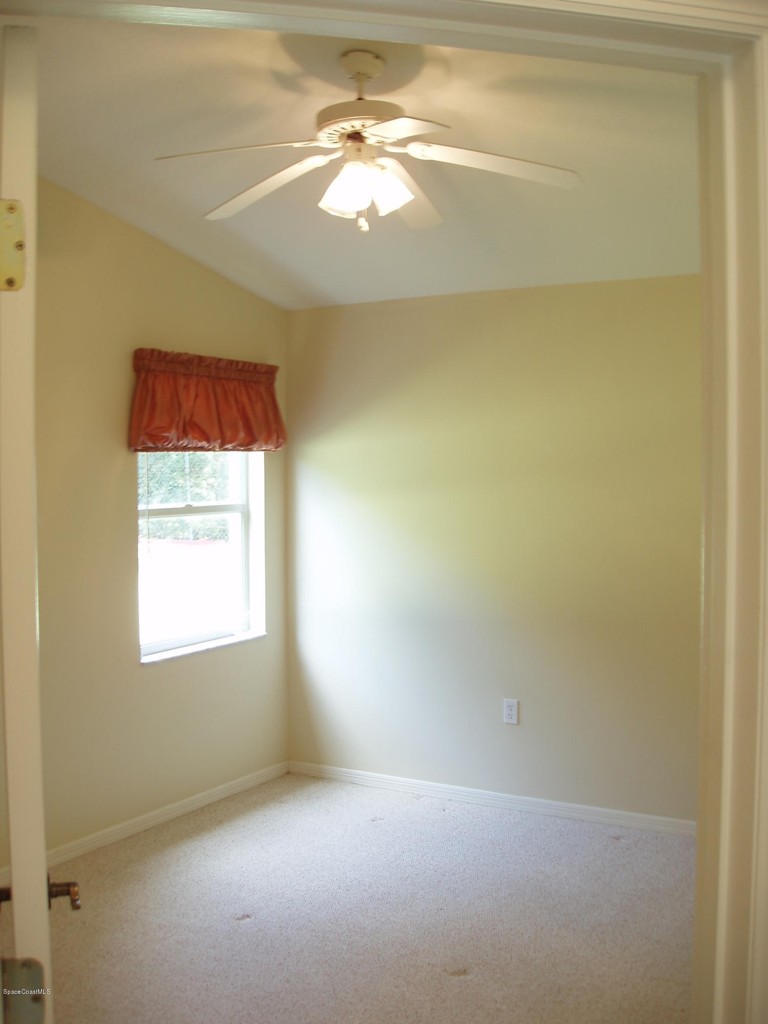 740 Riviera Drive Northeast Palm Bay, FL 32905 - Photo 19 of 30 Bedroom 3