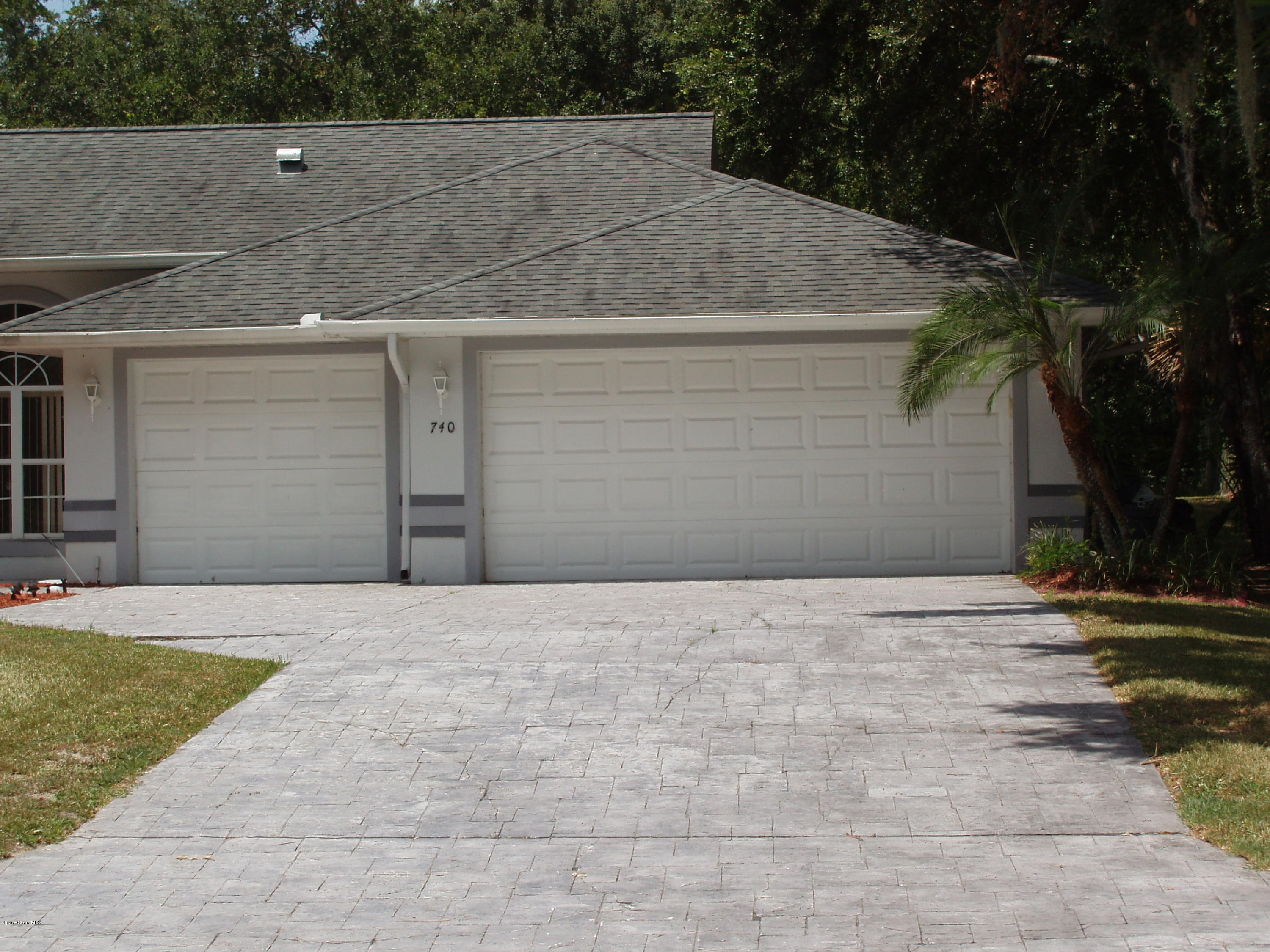740 Riviera Drive Northeast Palm Bay, FL 32905 - Photo 29 of 30 3 Car Garage