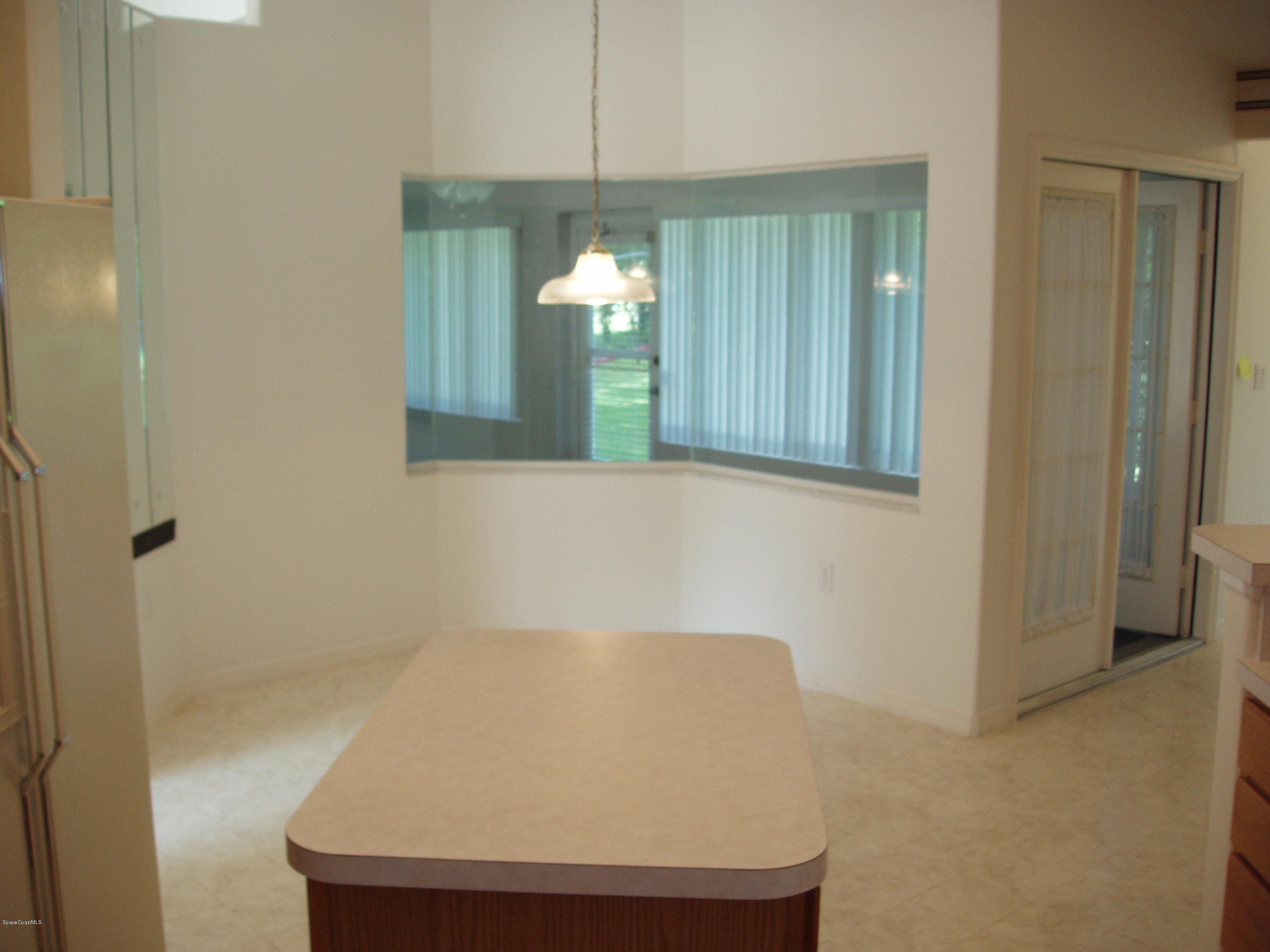 740 Riviera Drive Northeast Palm Bay, FL 32905 - Photo 6 of 30 Kitchen to Breakfast Nook