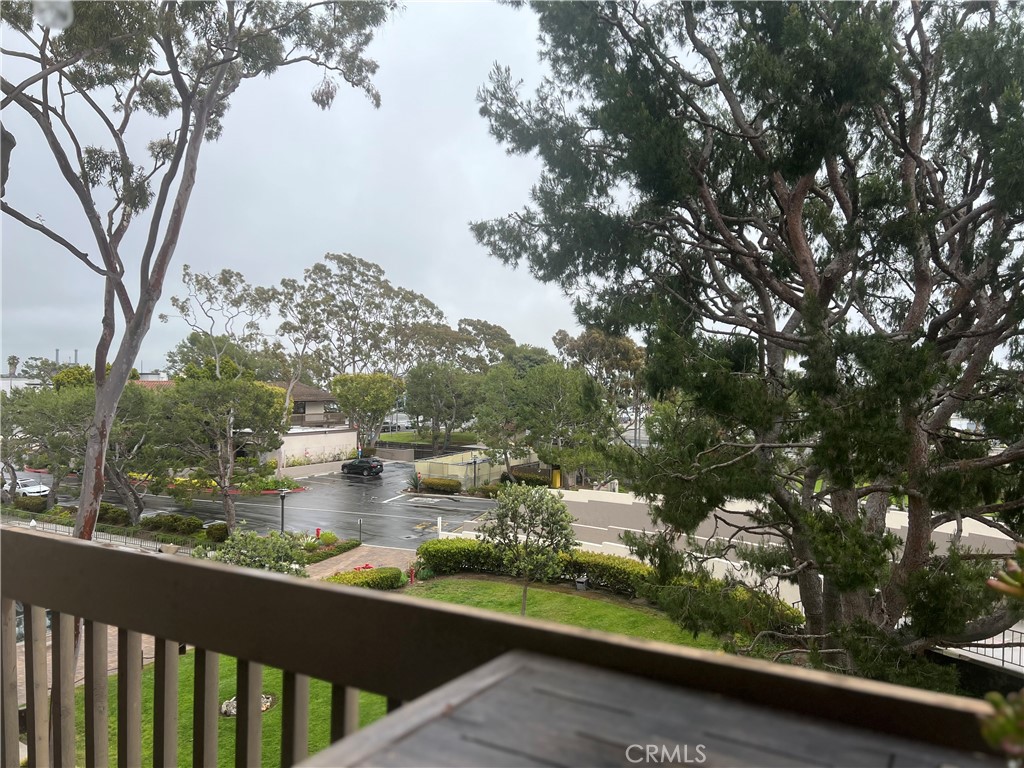 a view of swimming pool from a balcony
