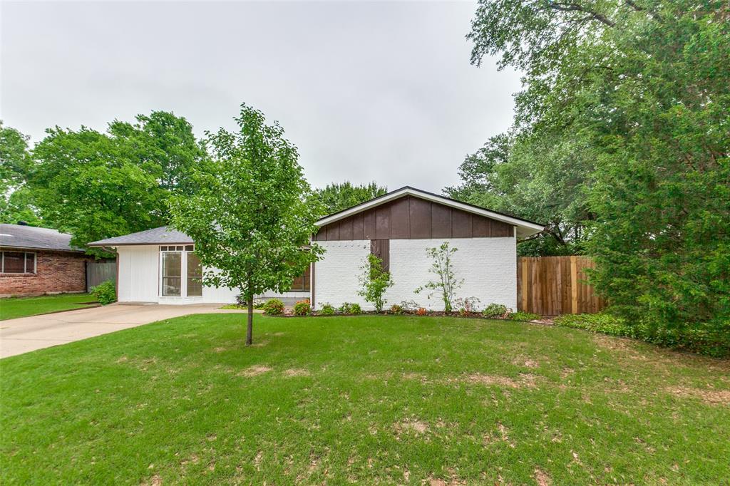 2718 Runningbrook Lane Dallas, TX 75228 - Photo 27 of 28 a view of a house with a yard and fence