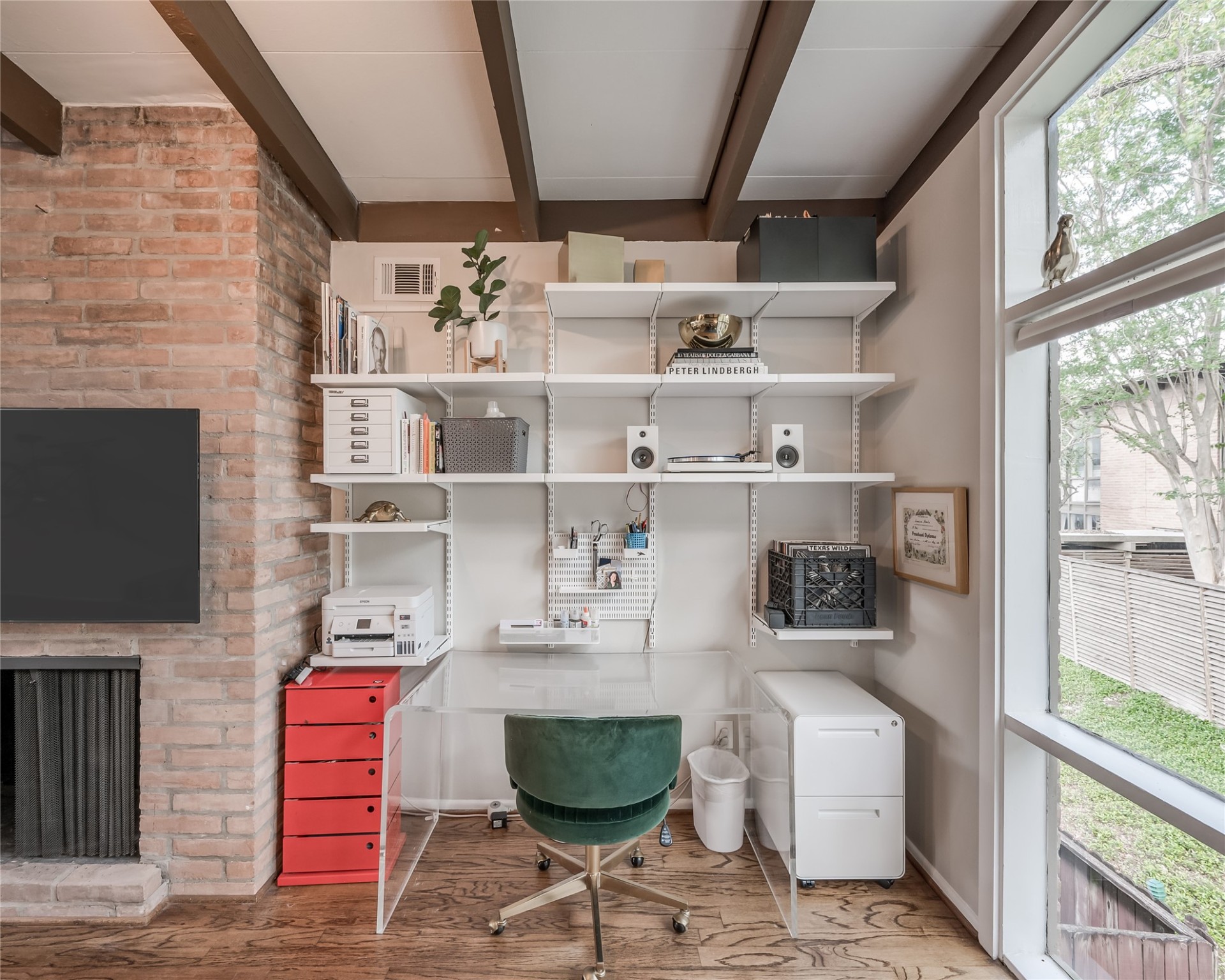 5222 Memorial Drive, Unit 5222 Houston, TX 77007 - Photo 11 of 32 a room with lots of books and a large window