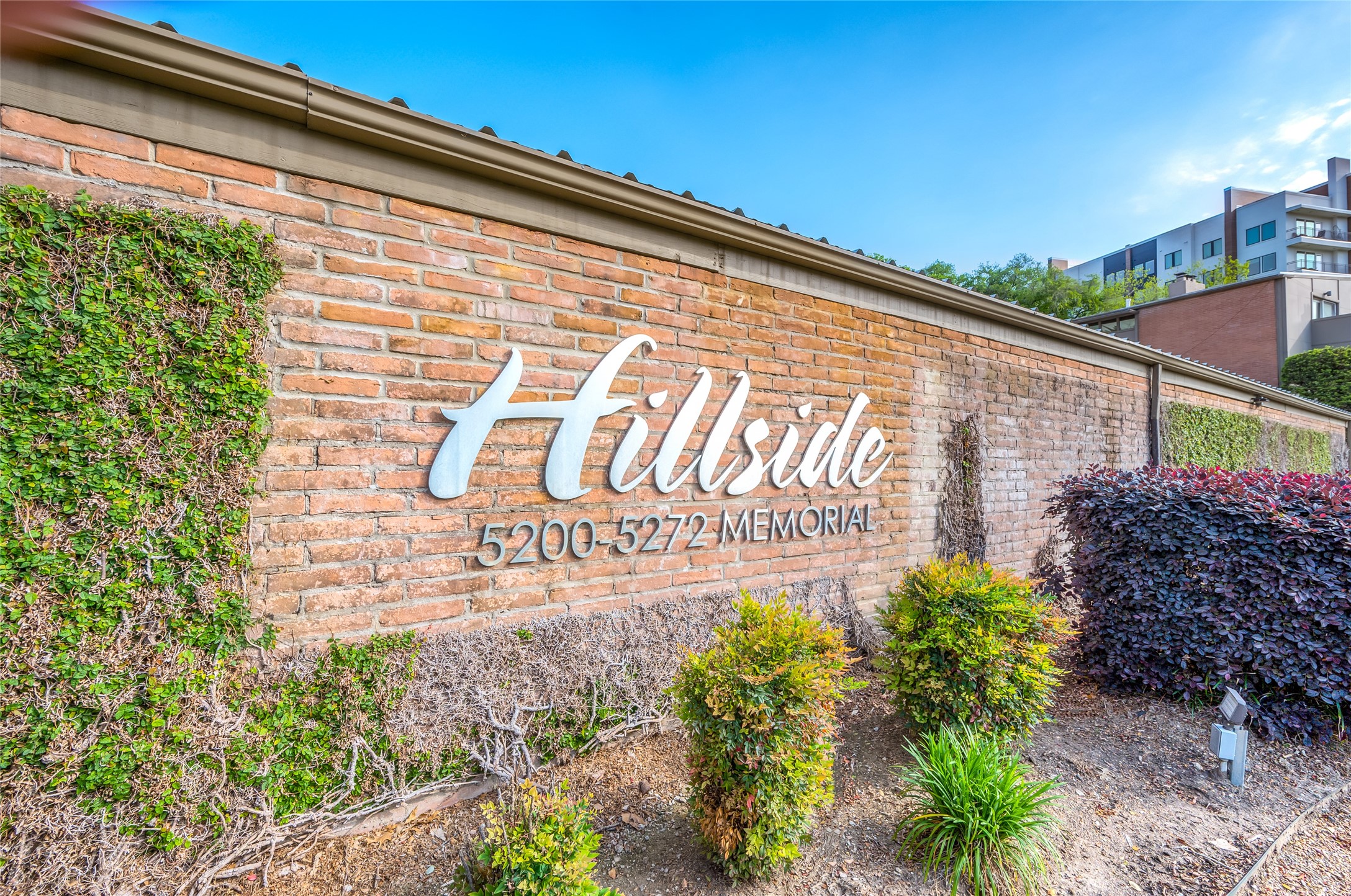 5222 Memorial Drive, Unit 5222 Houston, TX 77007 - Photo 22 of 32 a sign on the side of a building