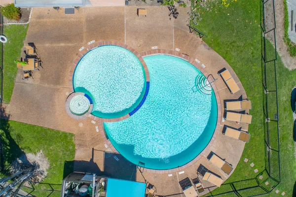 an aerial view of a swimming pool