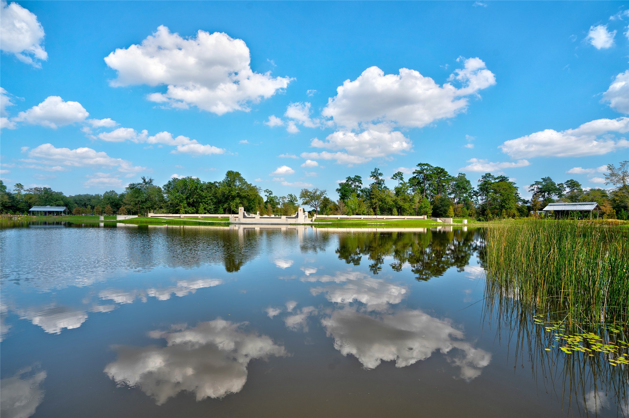 5222 Memorial Drive, Unit 5222 Houston, TX 77007 - Photo 31 of 32 a view of a lake with a yard