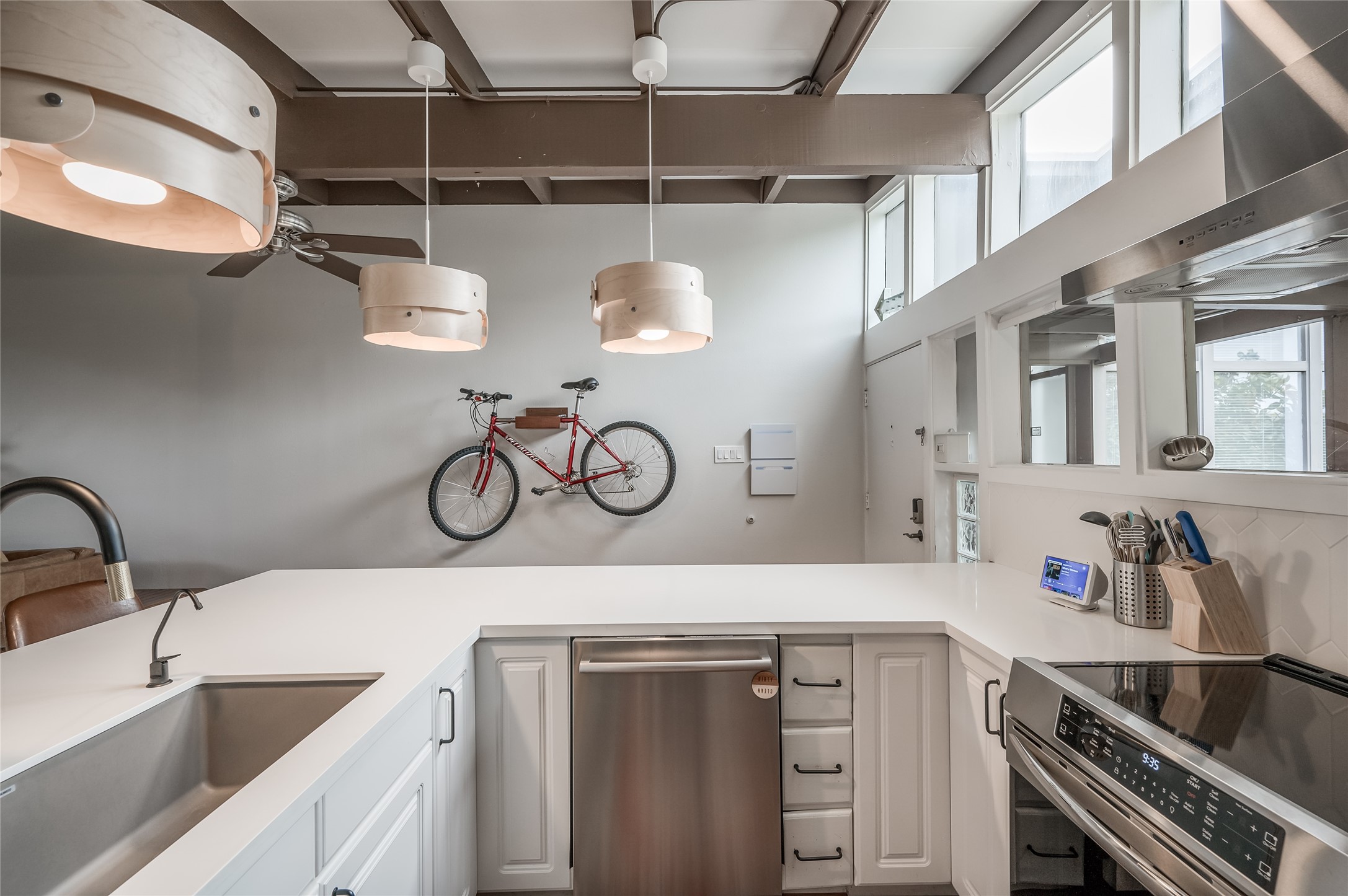 5222 Memorial Drive, Unit 5222 Houston, TX 77007 - Photo 5 of 32 a kitchen with a sink and cabinets