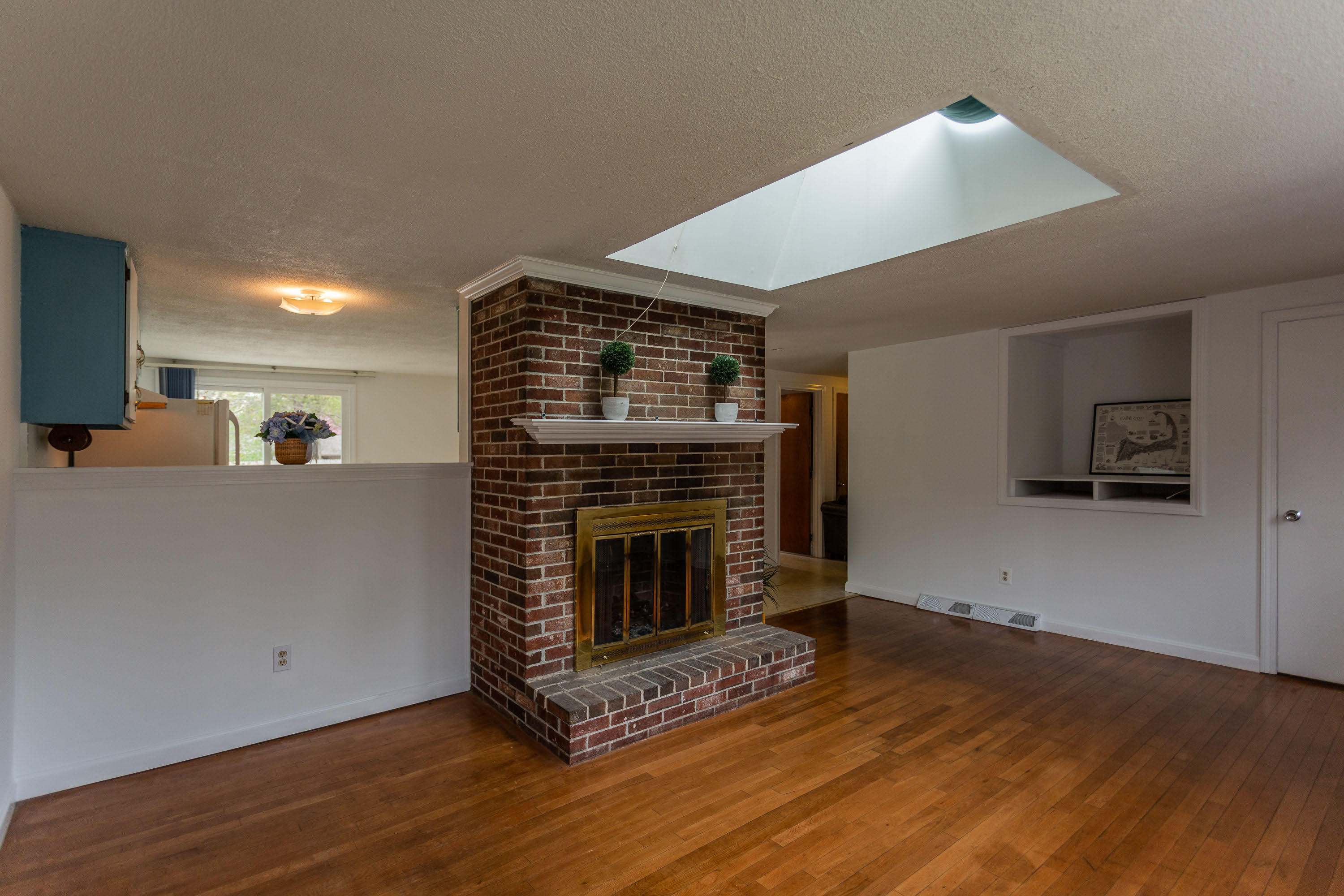 361 Megan Road Hyannis, MA 02601 - Photo 4 of 18 a living room with furniture and a fireplace