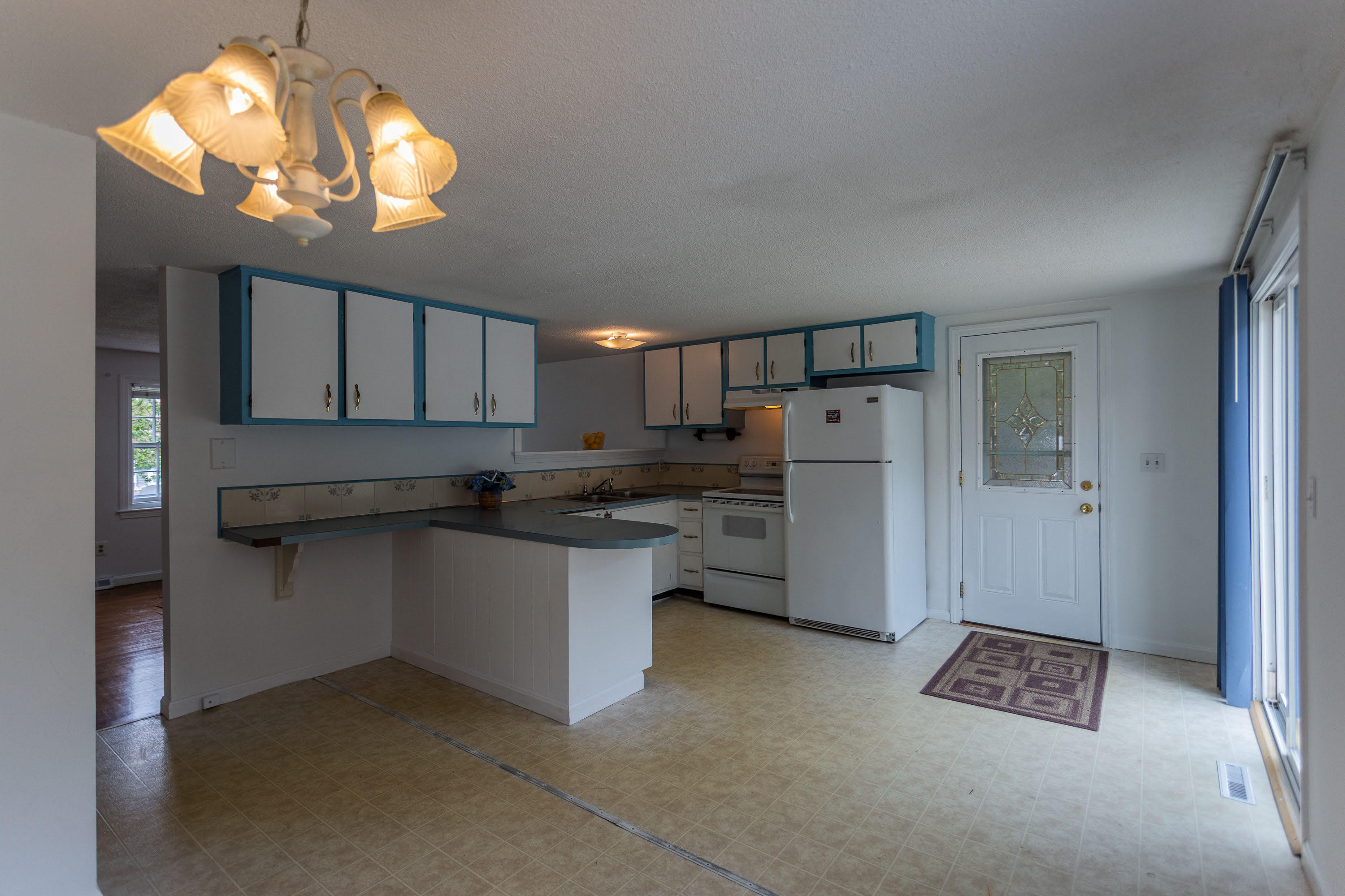 361 Megan Road Hyannis, MA 02601 - Photo 7 of 18 a kitchen with refrigerator and cabinets