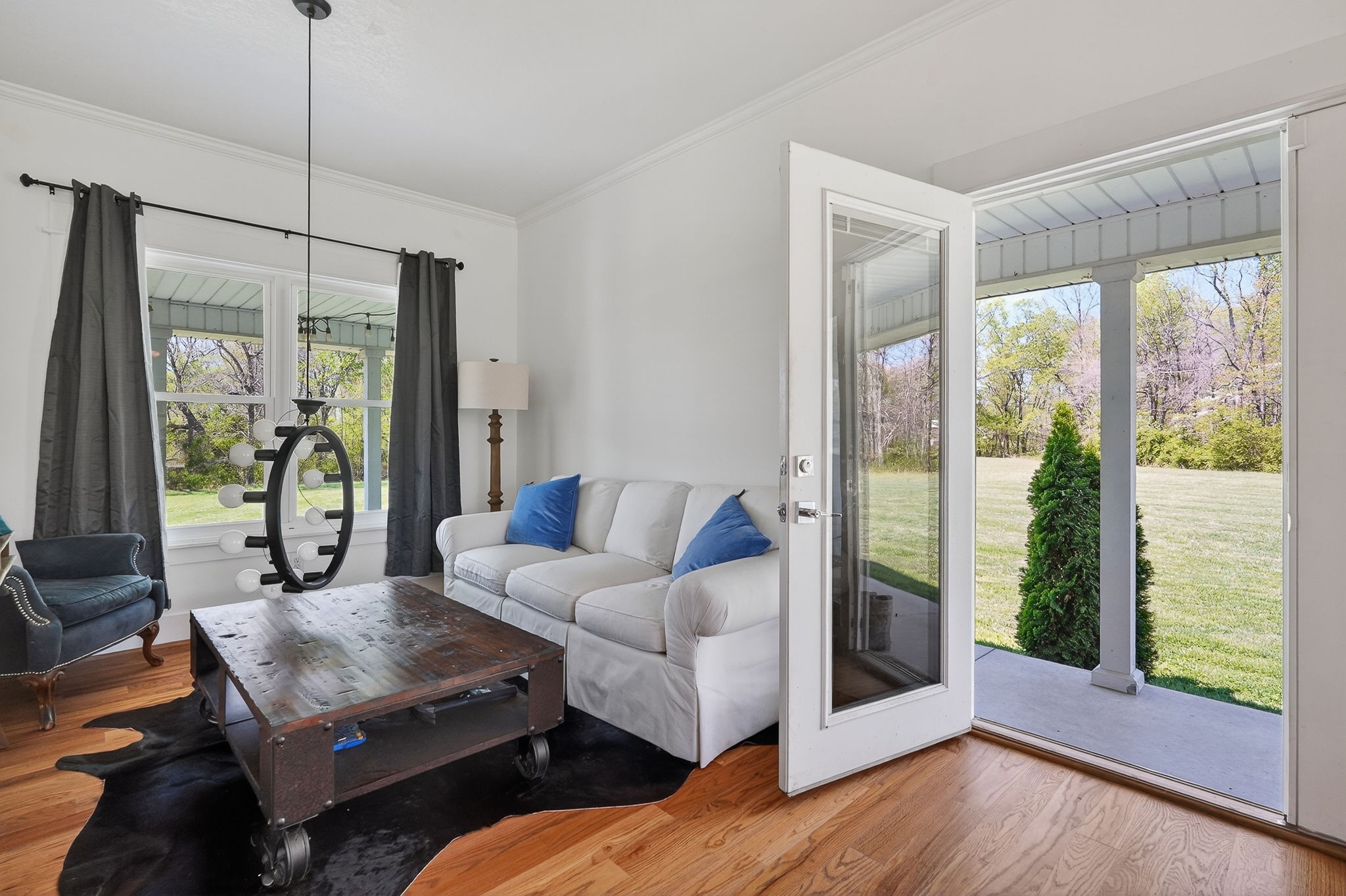 302 Ligon Street Baxter, TN 38544 - Photo 11 of 68 a living room with furniture and a floor to ceiling window