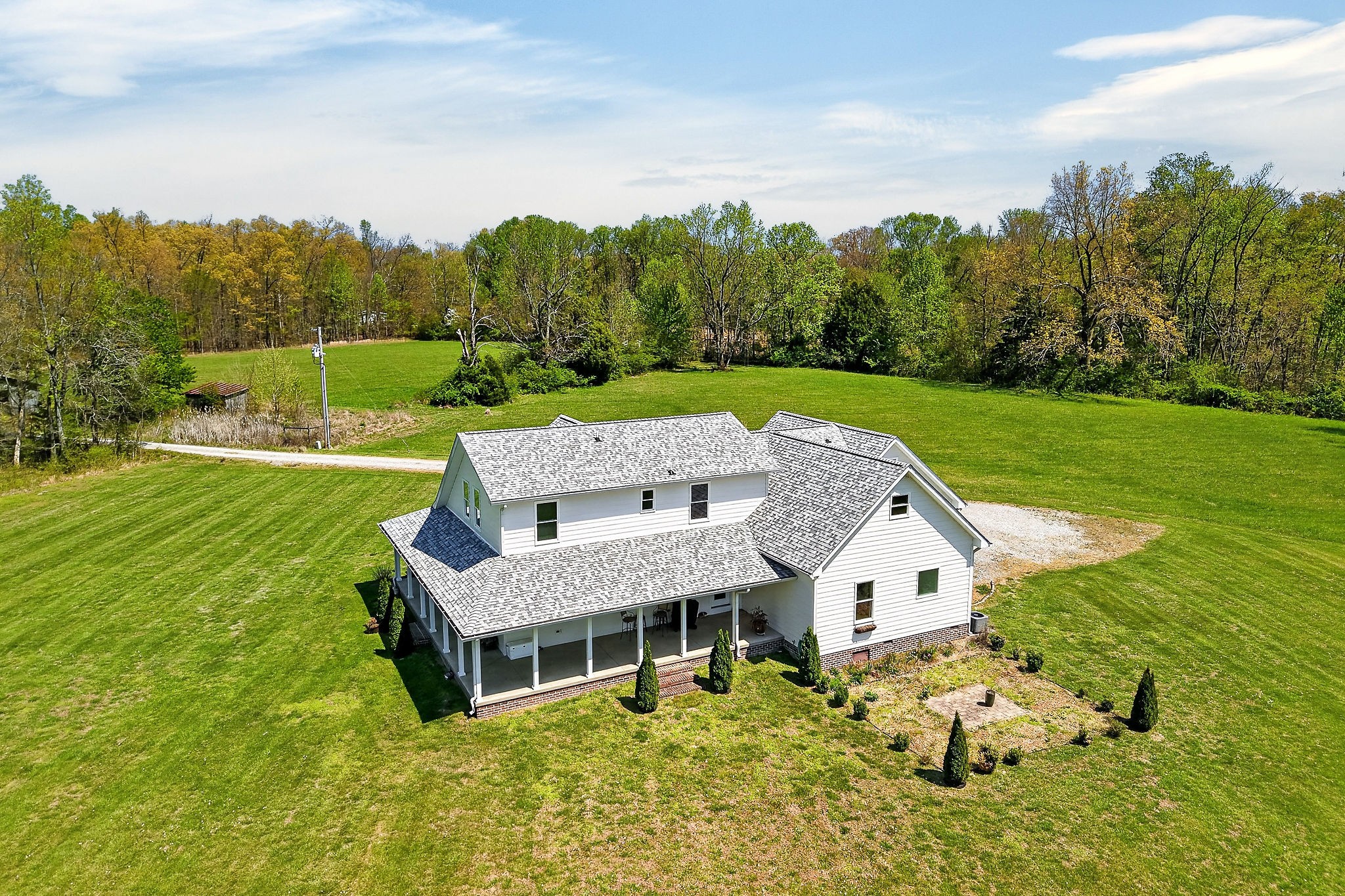 302 Ligon Street Baxter, TN 38544 - Photo 3 of 68 an aerial view of a house with big yard