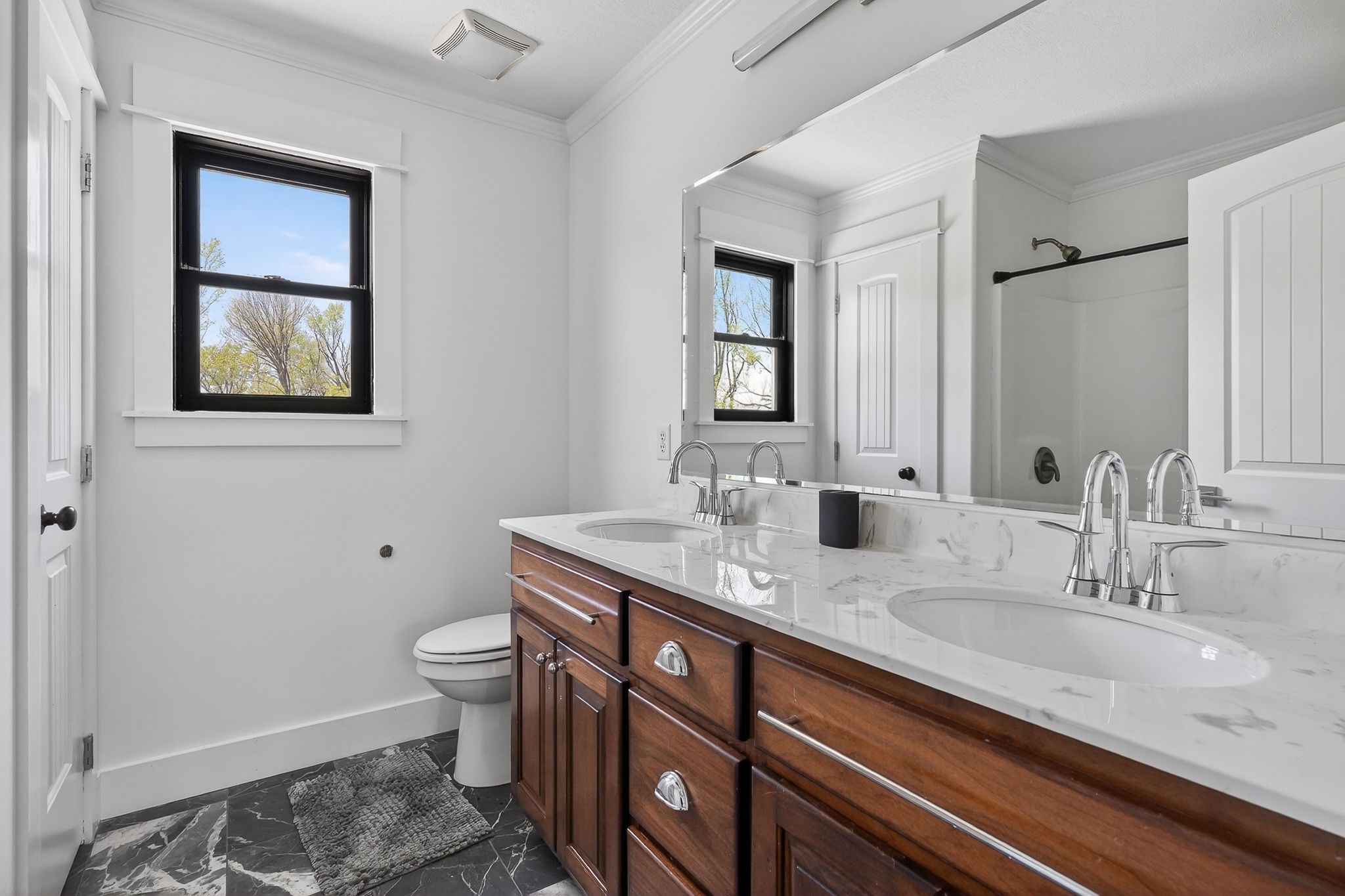302 Ligon Street Baxter, TN 38544 - Photo 36 of 68 a bathroom with a granite countertop toilet sink and mirror