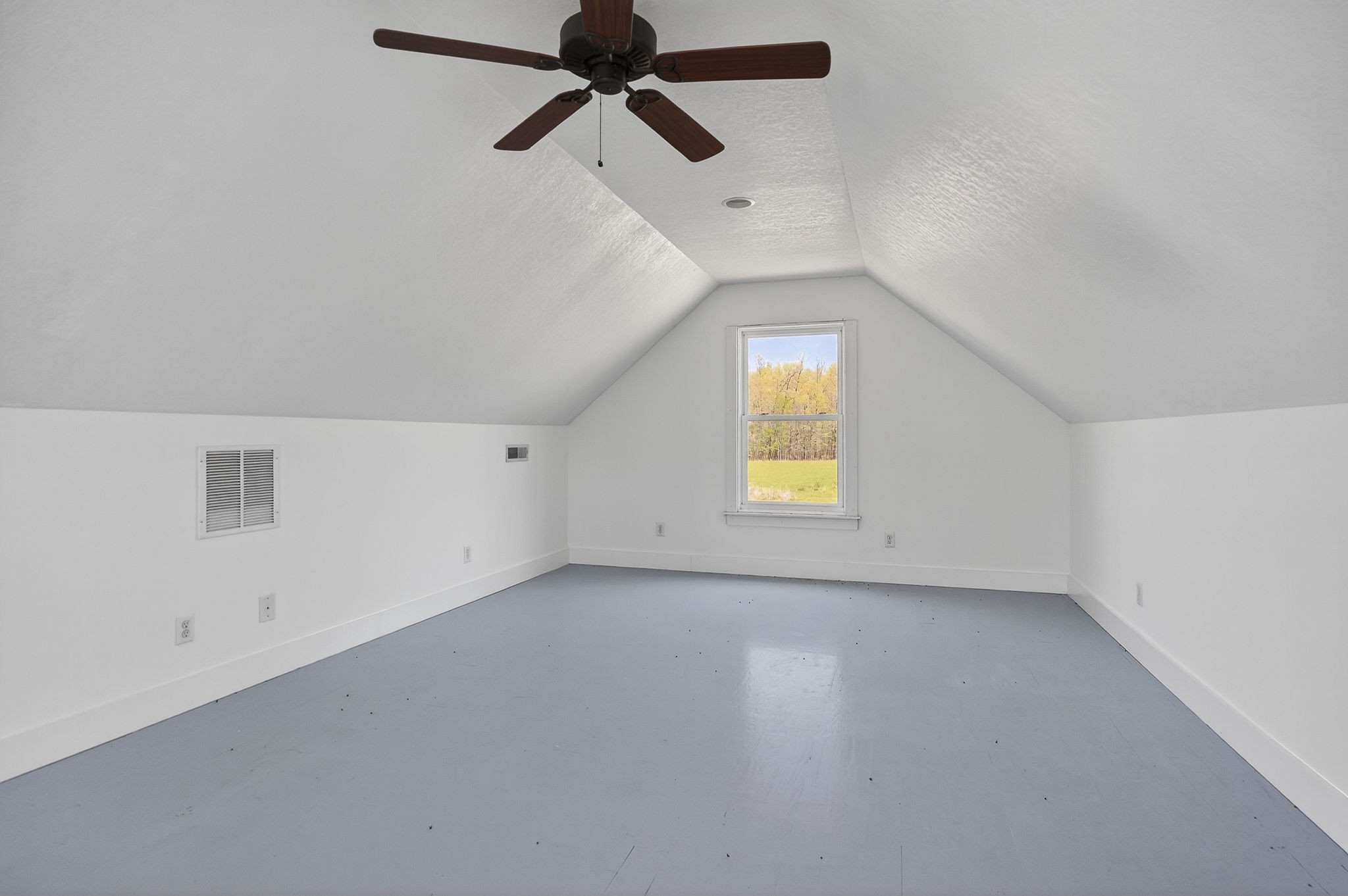 302 Ligon Street Baxter, TN 38544 - Photo 57 of 68 an empty room with windows and fan