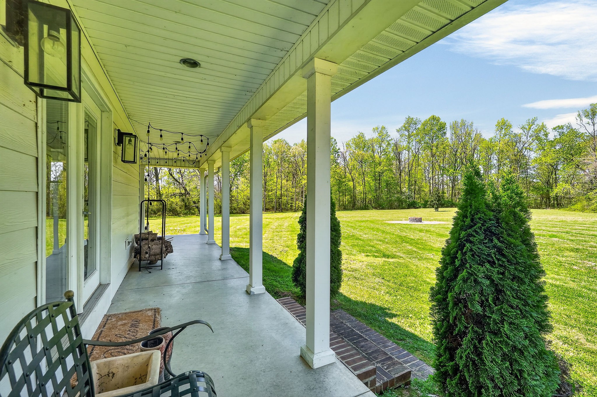 302 Ligon Street Baxter, TN 38544 - Photo 7 of 68 a room with trees in front of it
