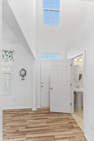 a view of a livingroom with wooden floor