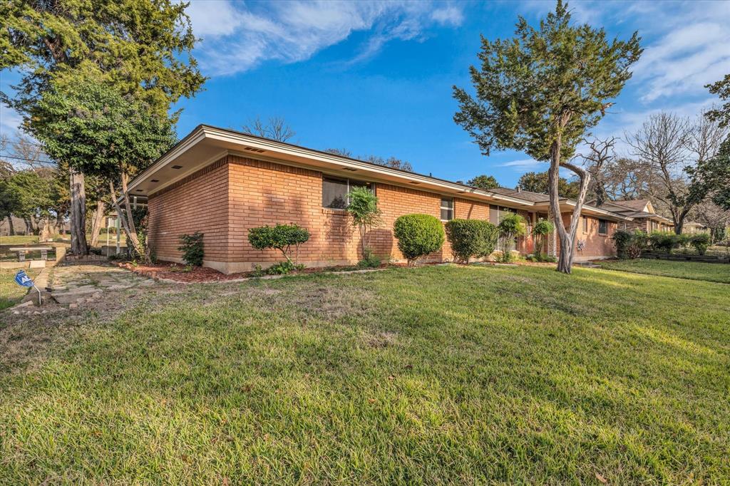 4325 Shady Glen Drive Waco, TX 76708 - Photo 2 of 40 a view of a house with a yard