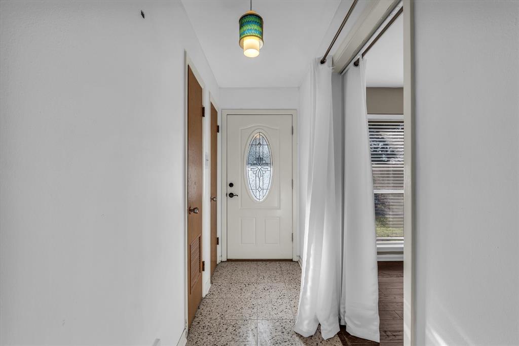4325 Shady Glen Drive Waco, TX 76708 - Photo 32 of 40 a view of a hallway with wooden floor and closet