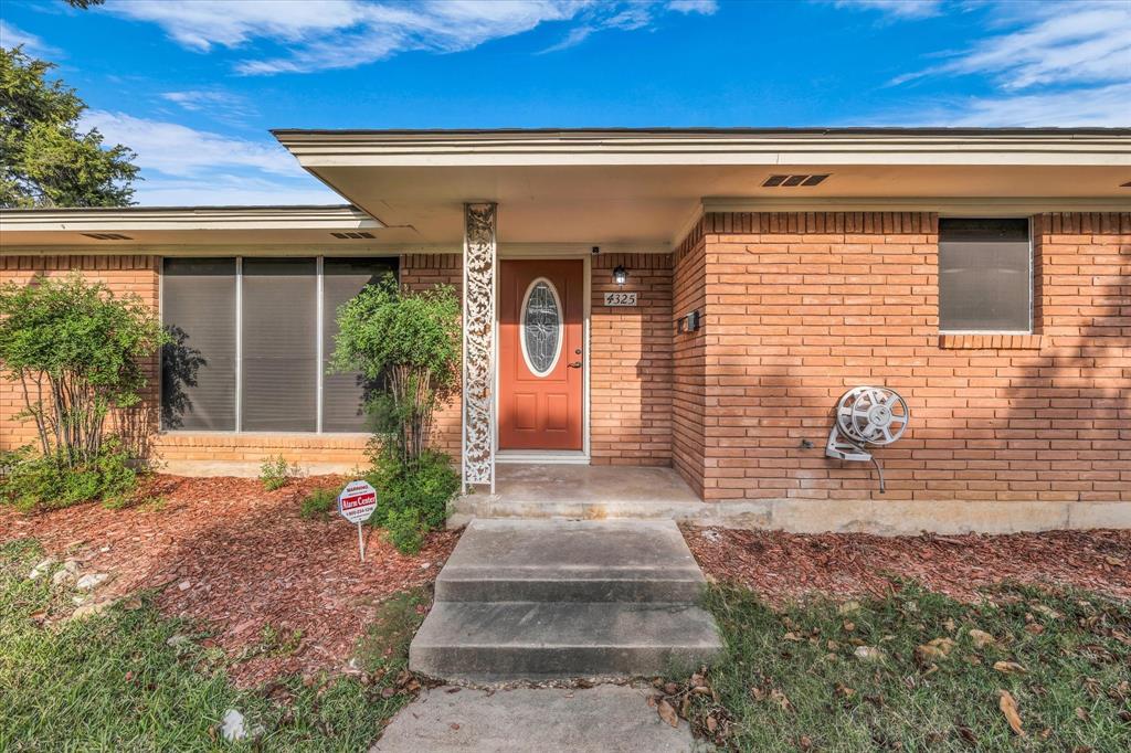 4325 Shady Glen Drive Waco, TX 76708 - Photo 39 of 40 a front view of a house with garden