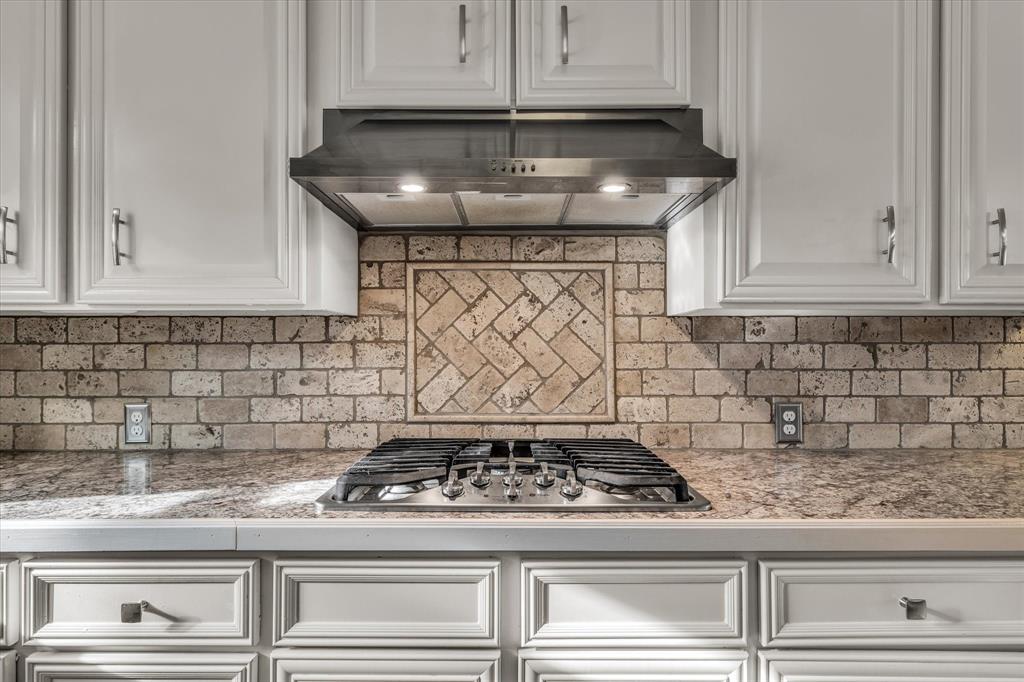 4325 Shady Glen Drive Waco, TX 76708 - Photo 10 of 40 a stove top oven sitting inside of a kitchen