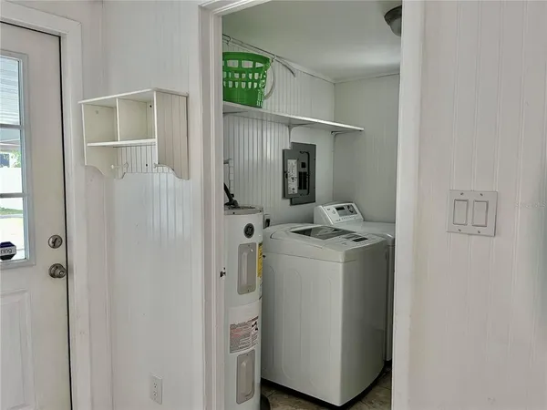 a utility room with dryer and washer