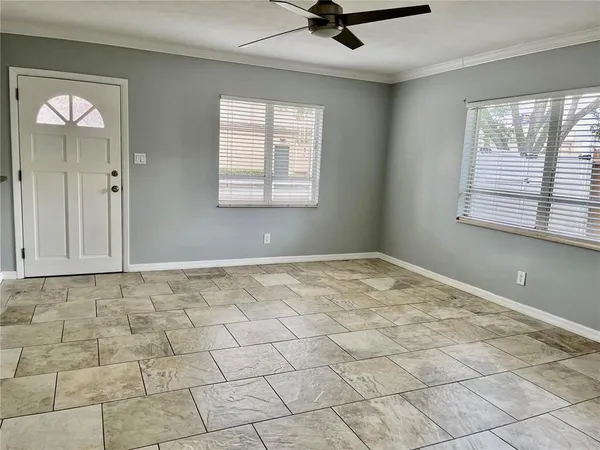 a view of an empty room and window