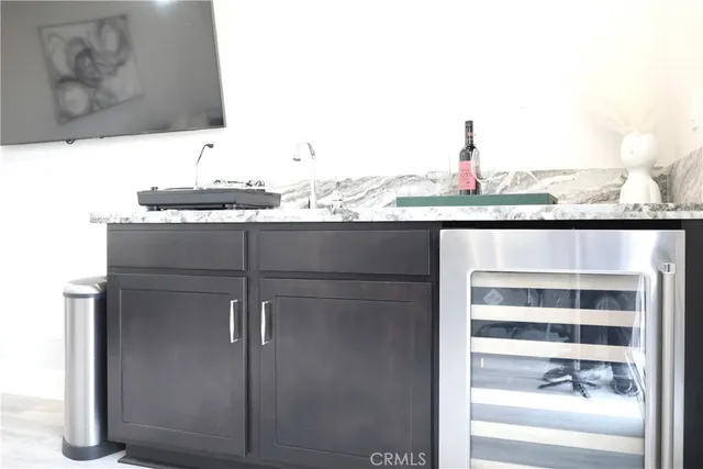 a view of a balcony with a table and chairs