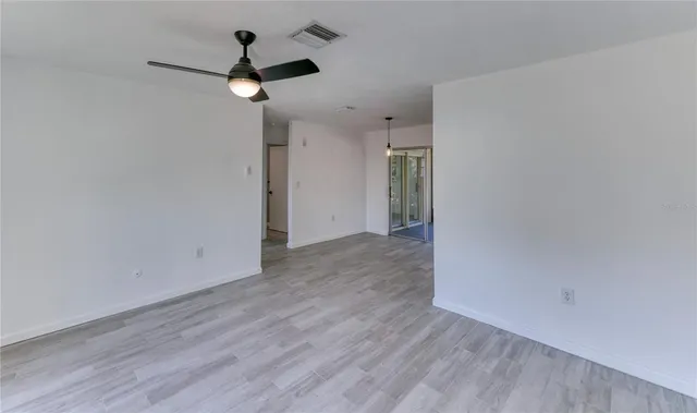 a view of a backyard with a small pool