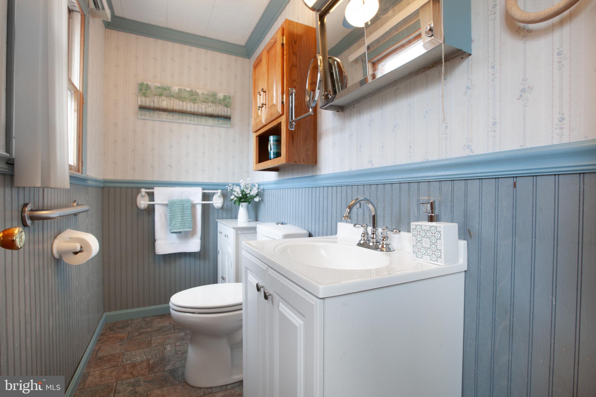 2446 Lodge Farm Road Sparrows Point, MD 21219 - Photo 13 of 52 Half Bath off Primary Bedroom. Room for Shower?