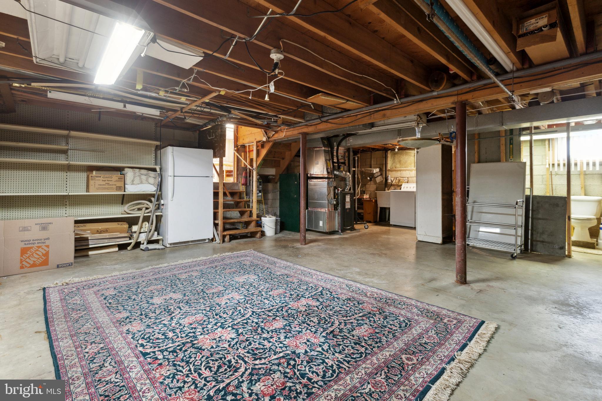 2446 Lodge Farm Road Sparrows Point, MD 21219 - Photo 25 of 52 Basement with Extra Fridge