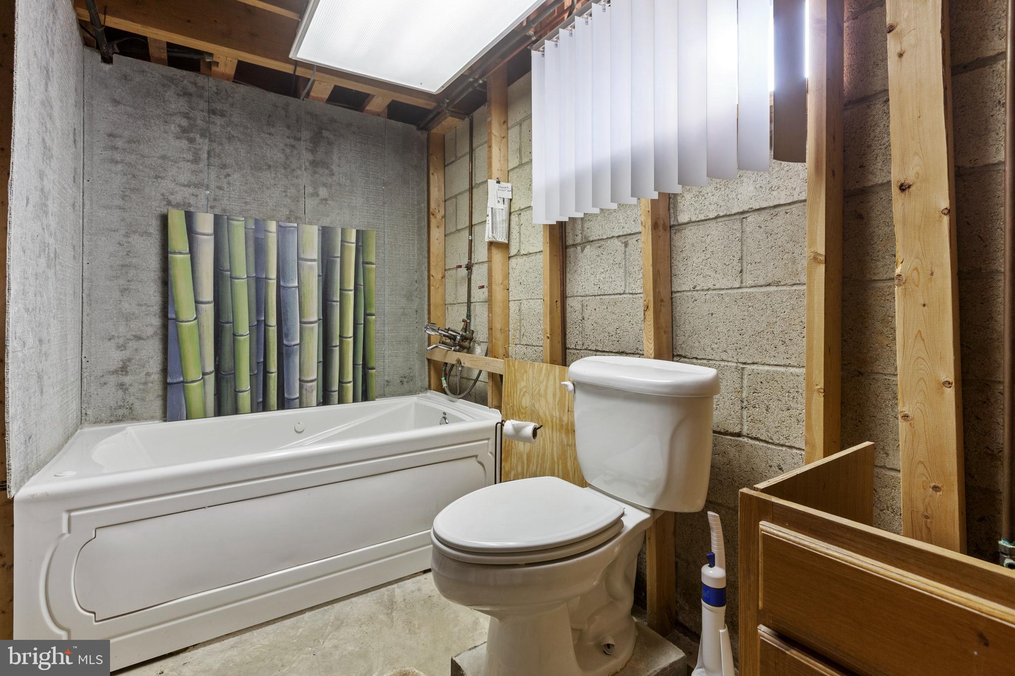 2446 Lodge Farm Road Sparrows Point, MD 21219 - Photo 28 of 52 Plumbed 2nd Full Bath - Basement with Pocket Door