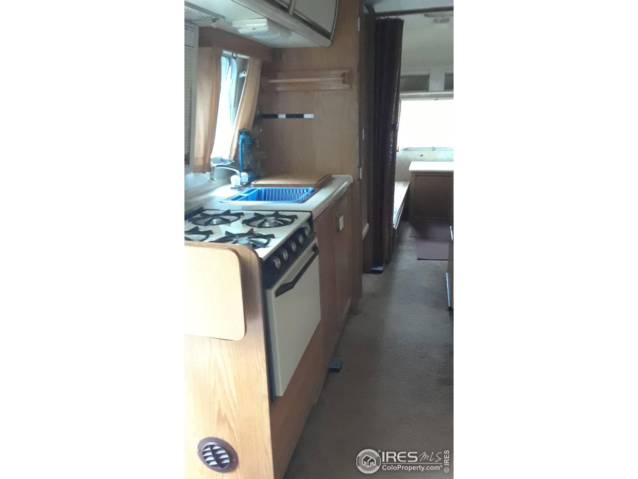 3957 Conifer Hill Road Lyons, CO 80540 - Photo 6 of 12 Propane serves stove and heater in the airstream. No electric hooked up for lights or refrigerator.