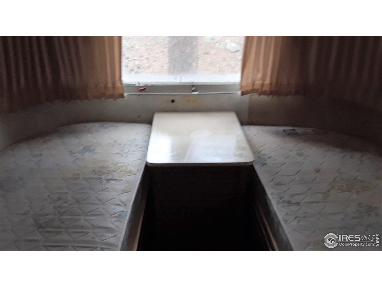 3957 Conifer Hill Road Lyons, CO 80540 - Photo 8 of 12 Two twin beds in back room