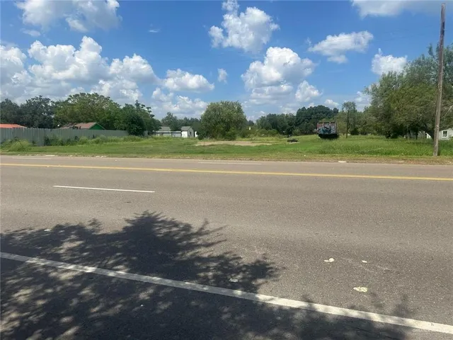 a view of a lake with a yard