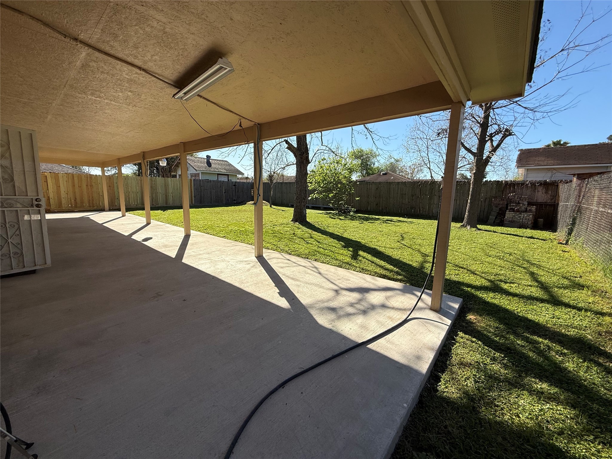 4114 Connorvale Road Houston, TX 77039 - Photo 14 of 18 a view of a swimming pool with a porch