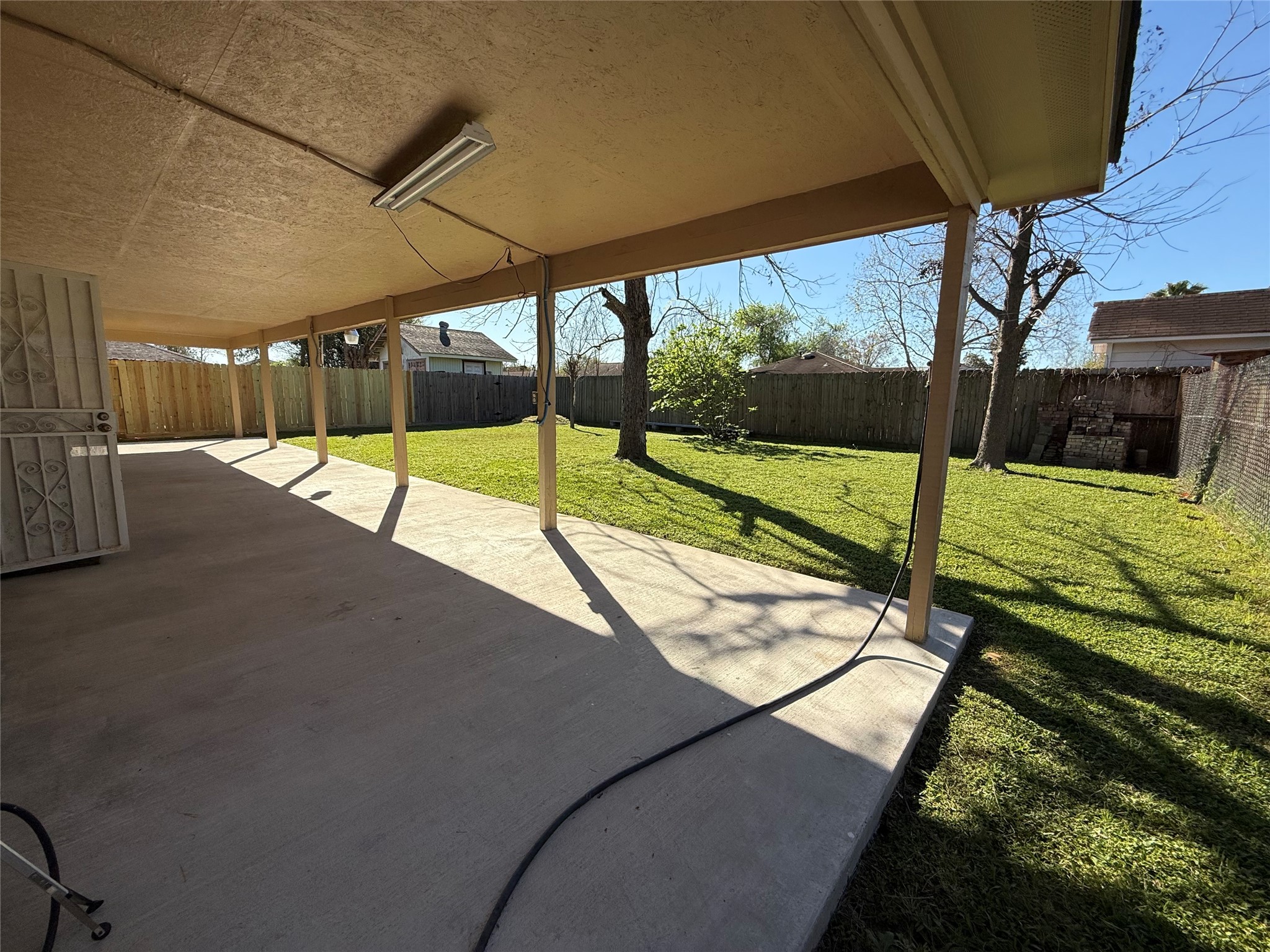 4114 Connorvale Road Houston, TX 77039 - Photo 16 of 18 a view of swimming pool with a patio