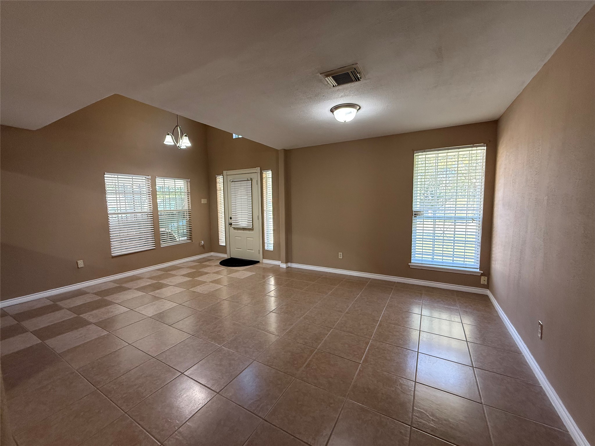 4114 Connorvale Road Houston, TX 77039 - Photo 7 of 18 a view of an empty room with windows