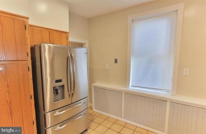 855 North 24th Street Philadelphia, PA 19130 - Photo 12 of 35 a view of kitchen with stainless steel appliances cabinets and refrigerator