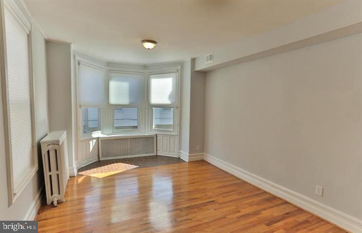 855 North 24th Street Philadelphia, PA 19130 - Photo 14 of 35 a view of empty room with wooden floor
