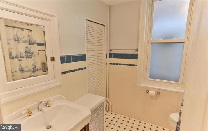 855 North 24th Street Philadelphia, PA 19130 - Photo 17 of 35 a bathroom with a sink and a shower