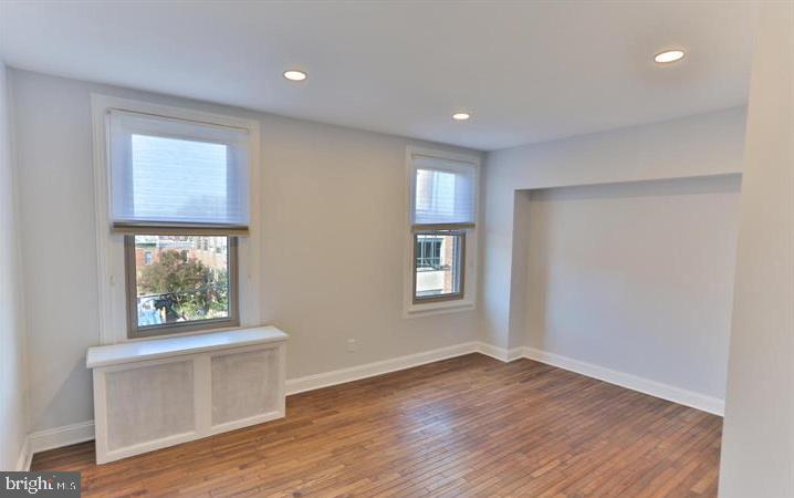 855 North 24th Street Philadelphia, PA 19130 - Photo 24 of 35 a view of empty room with wooden floor and fan