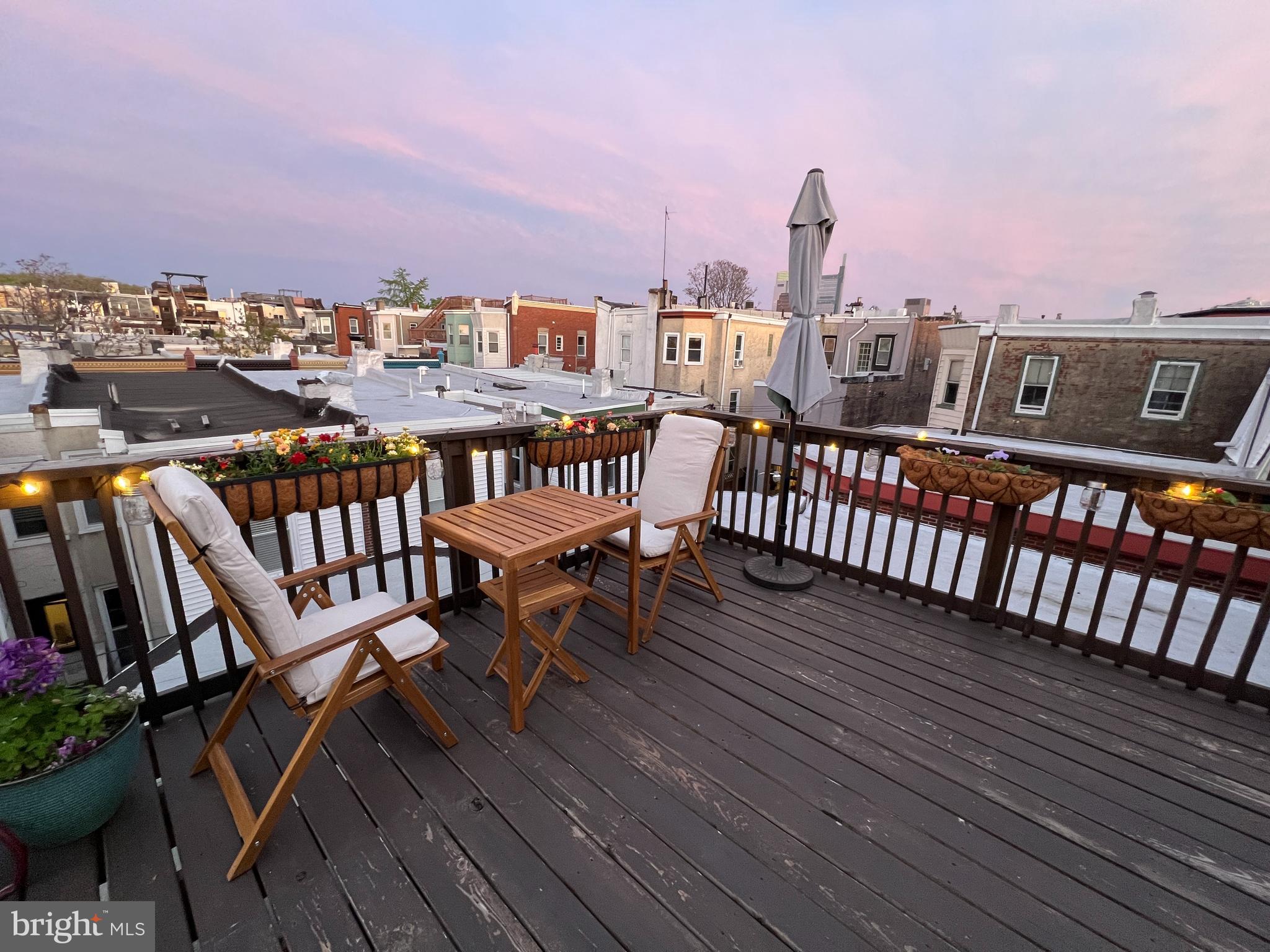 855 North 24th Street Philadelphia, PA 19130 - Photo 28 of 35 a view of a balcony with wooden benches