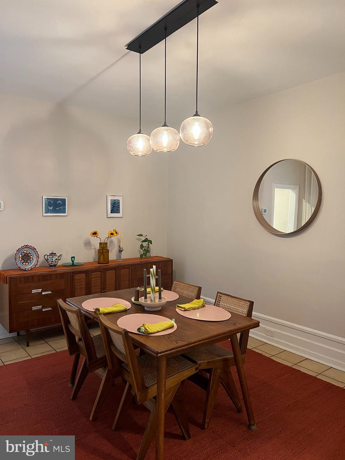 855 North 24th Street Philadelphia, PA 19130 - Photo 35 of 35 a view of a dining room with furniture and wooden floor