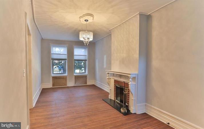 855 North 24th Street Philadelphia, PA 19130 - Photo 5 of 35 a view of livingroom with hardwood floor and a ceiling fan