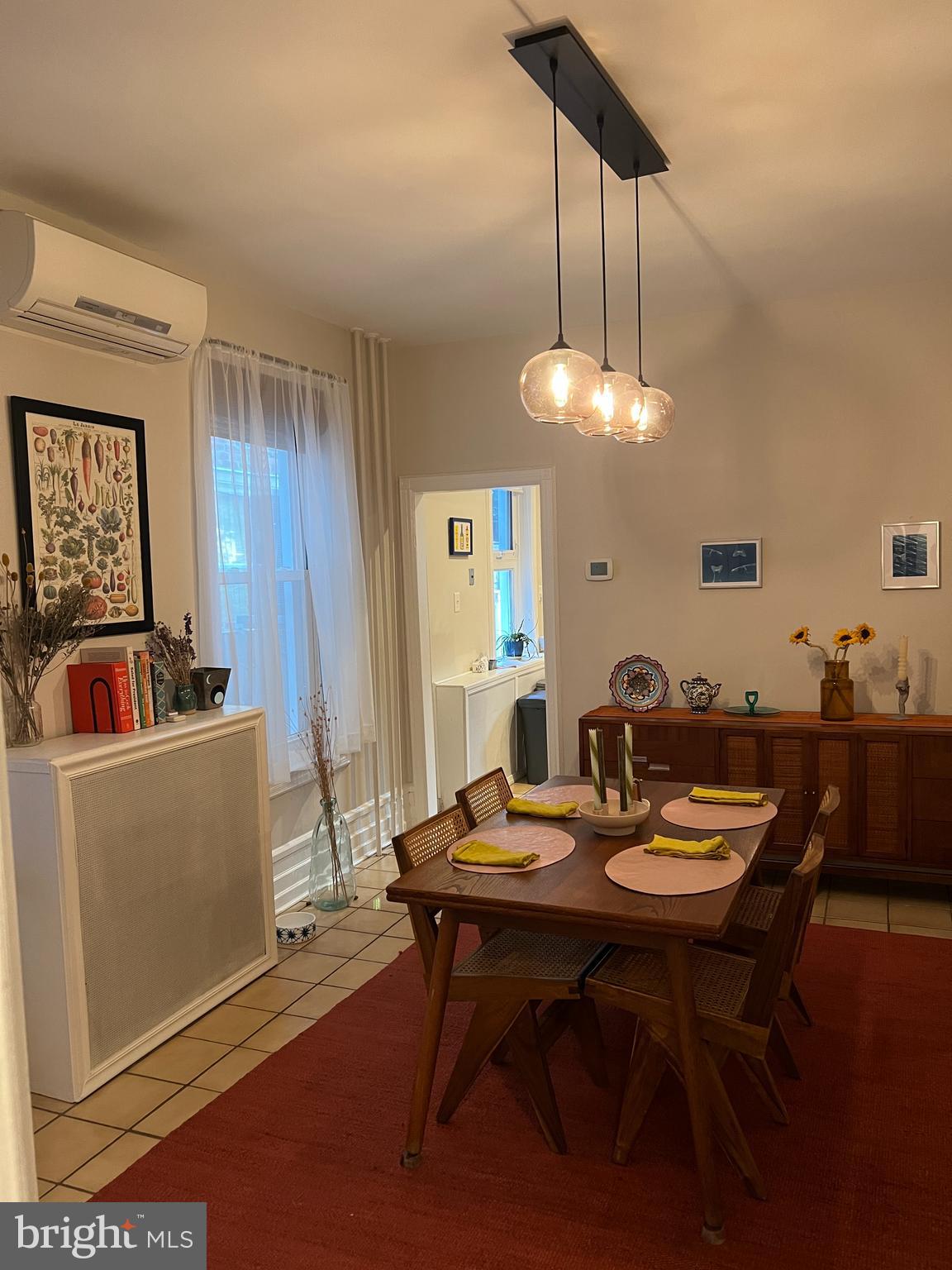 855 North 24th Street Philadelphia, PA 19130 - Photo 9 of 35 a view of a dining room with furniture and wooden floor
