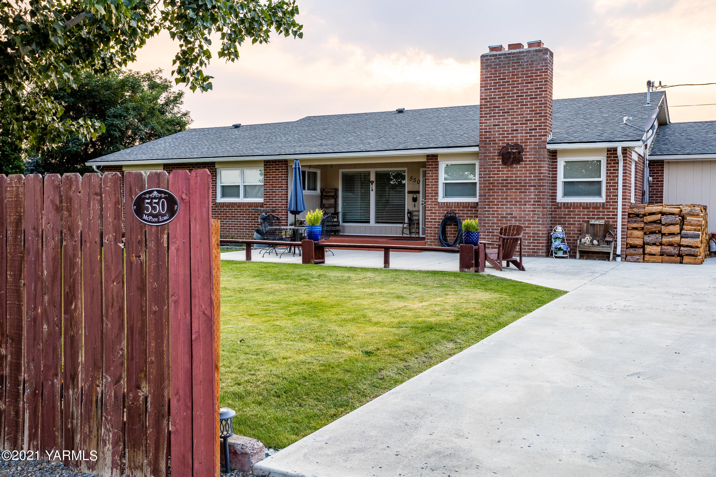 550 McPhee Road Naches, WA 98937 - Photo 1 of 28 a view of a house with a yard and sitting area
