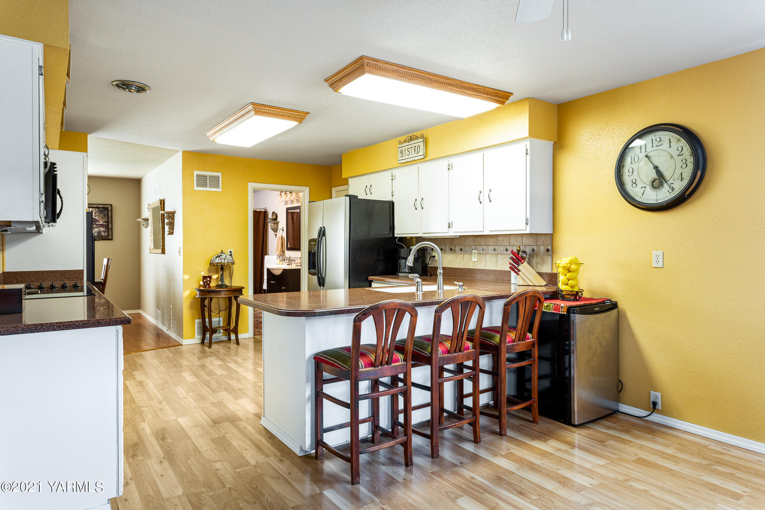 550 McPhee Road Naches, WA 98937 - Photo 12 of 28 a view of a dining area with furniture and a large window