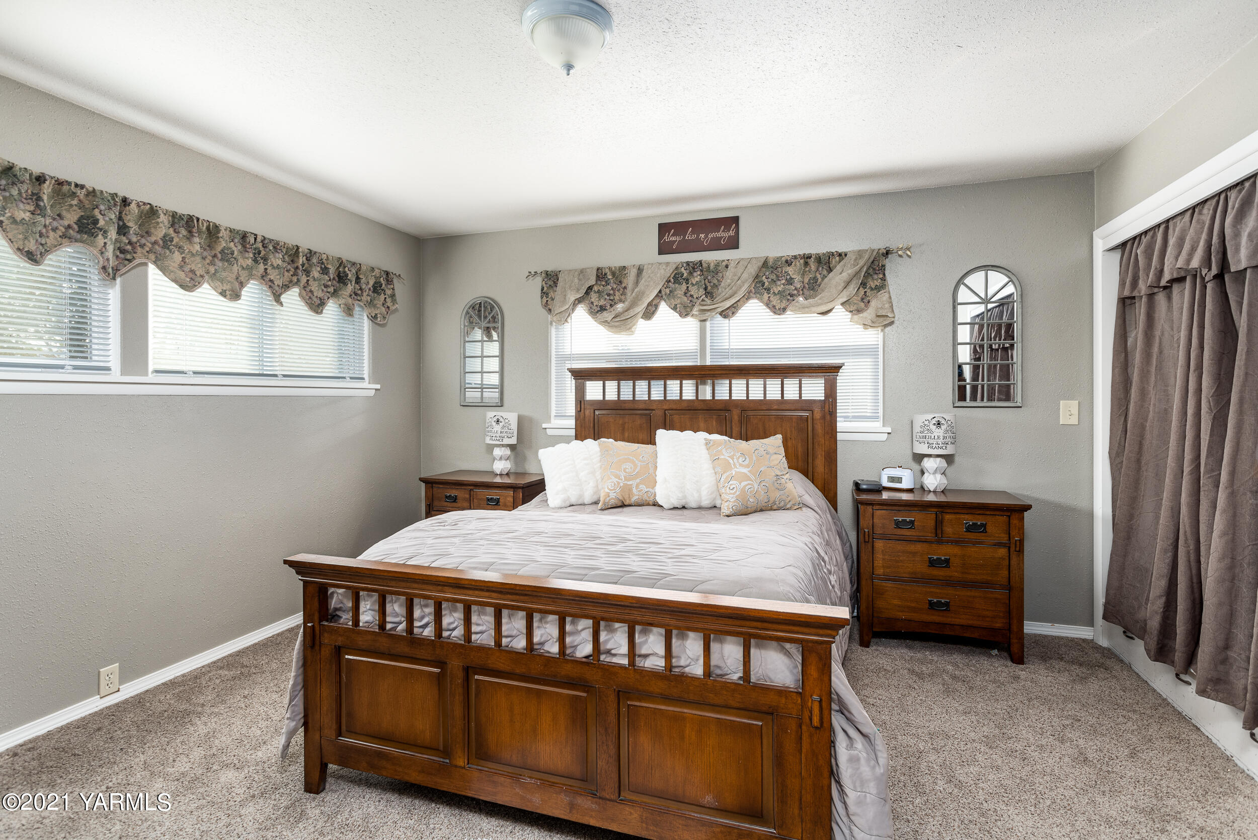 550 McPhee Road Naches, WA 98937 - Photo 14 of 28 a bedroom with a bed and window