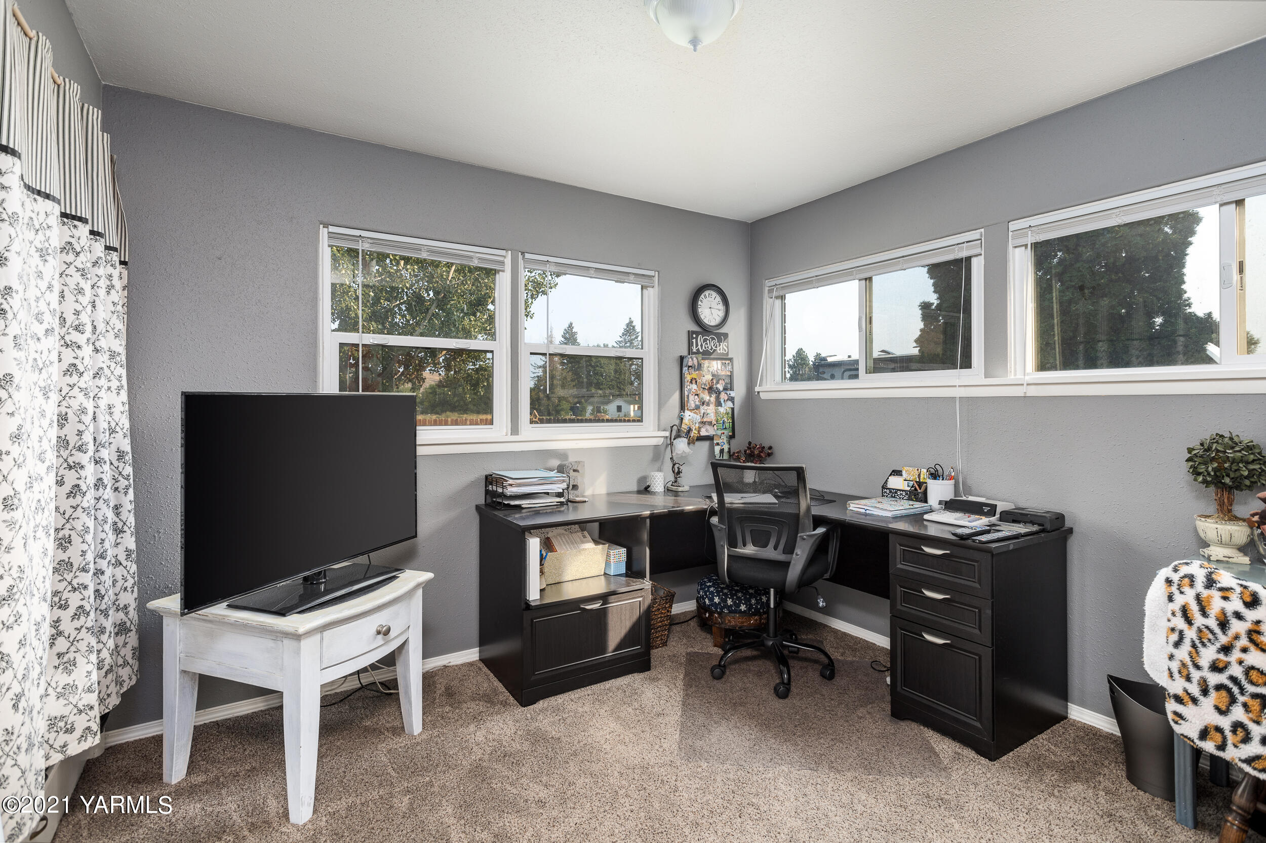 550 McPhee Road Naches, WA 98937 - Photo 16 of 28 a view of a workspace with furniture and a window