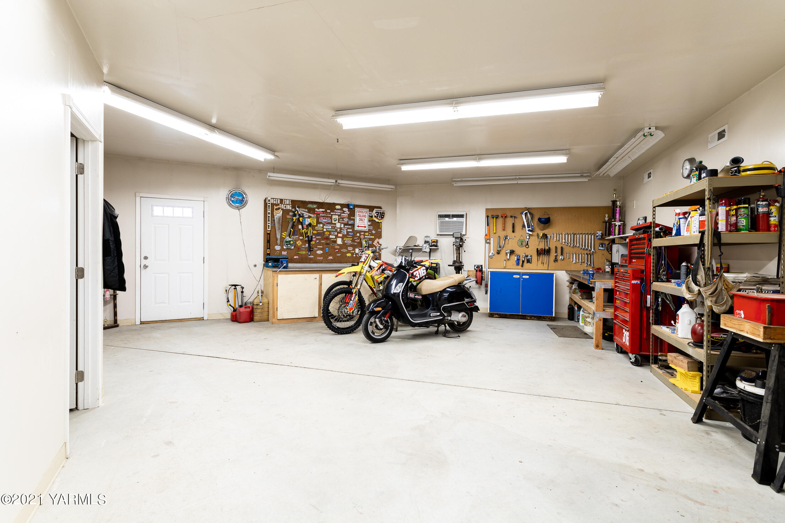 550 McPhee Road Naches, WA 98937 - Photo 27 of 28 a view of a garage with furniture and a fan