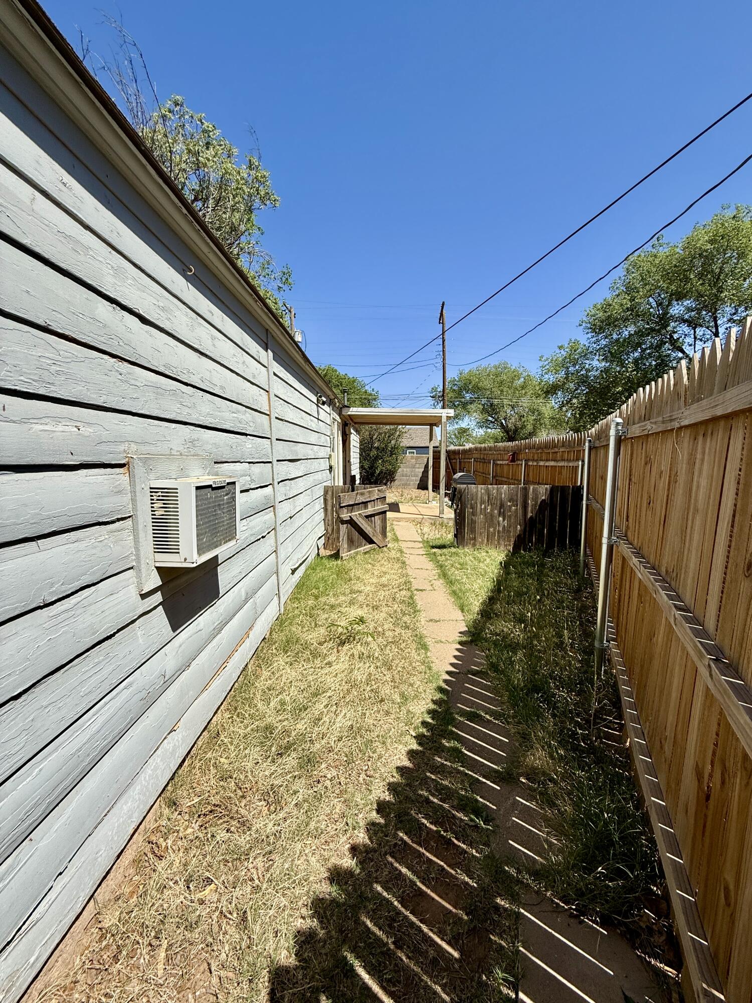 2216 30th Street, Unit REAR Lubbock, TX 79411 - Photo 14 of 14 a view of a balcony with chairs